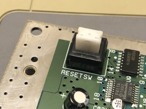 The reset button was on the main board ...